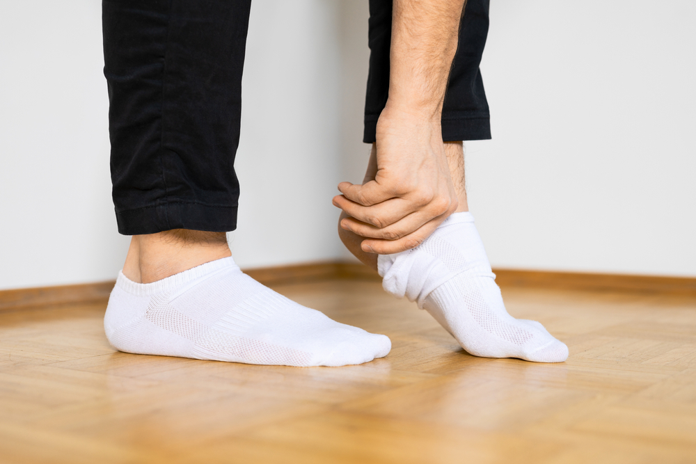 White ankle socks paired with black pants.